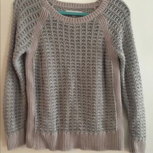 Neutral gray with metallic silver thread sweater.